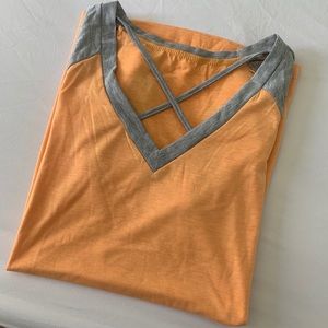 Orange and grey v neck tee